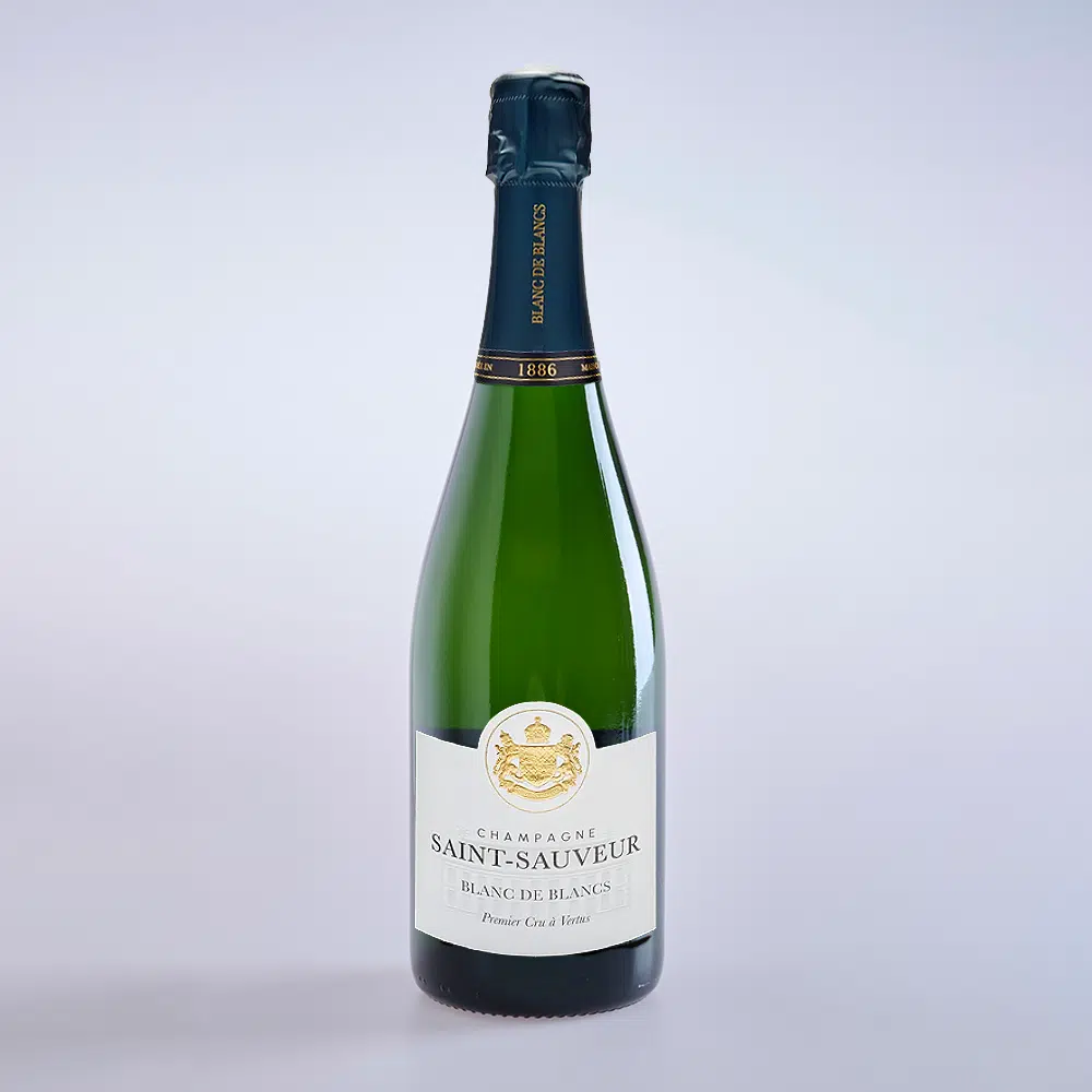 The photo shows a bottle of Blanc de Blancs champagne from Saint Sauveur